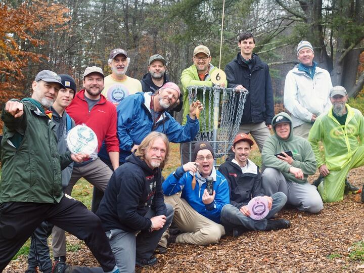 Chester Disc Golf Club players gathered for a tournament in the woods